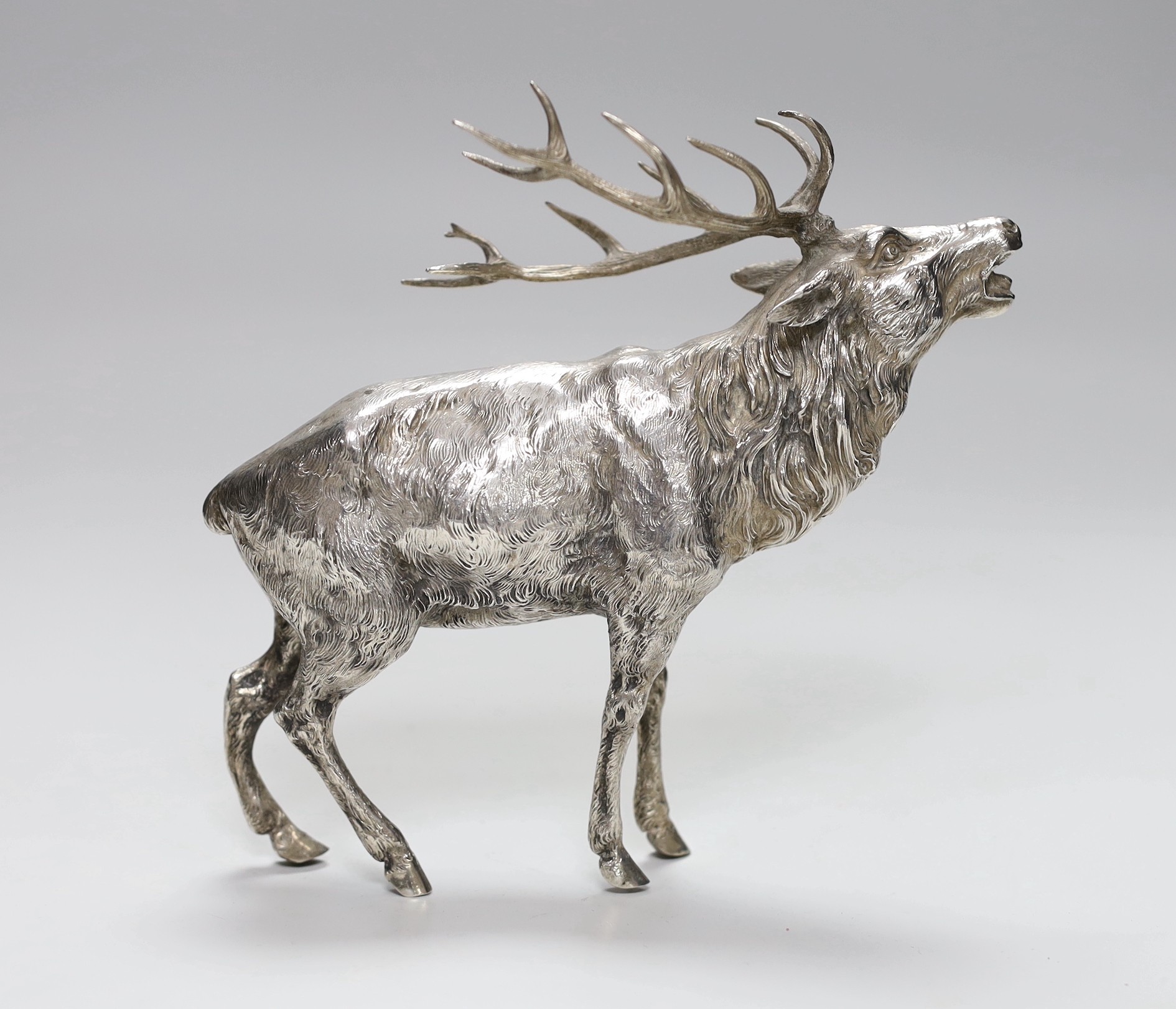 An 800 standard white metal free standing miniature model of a stag, height 18.3cm, 15.6oz.